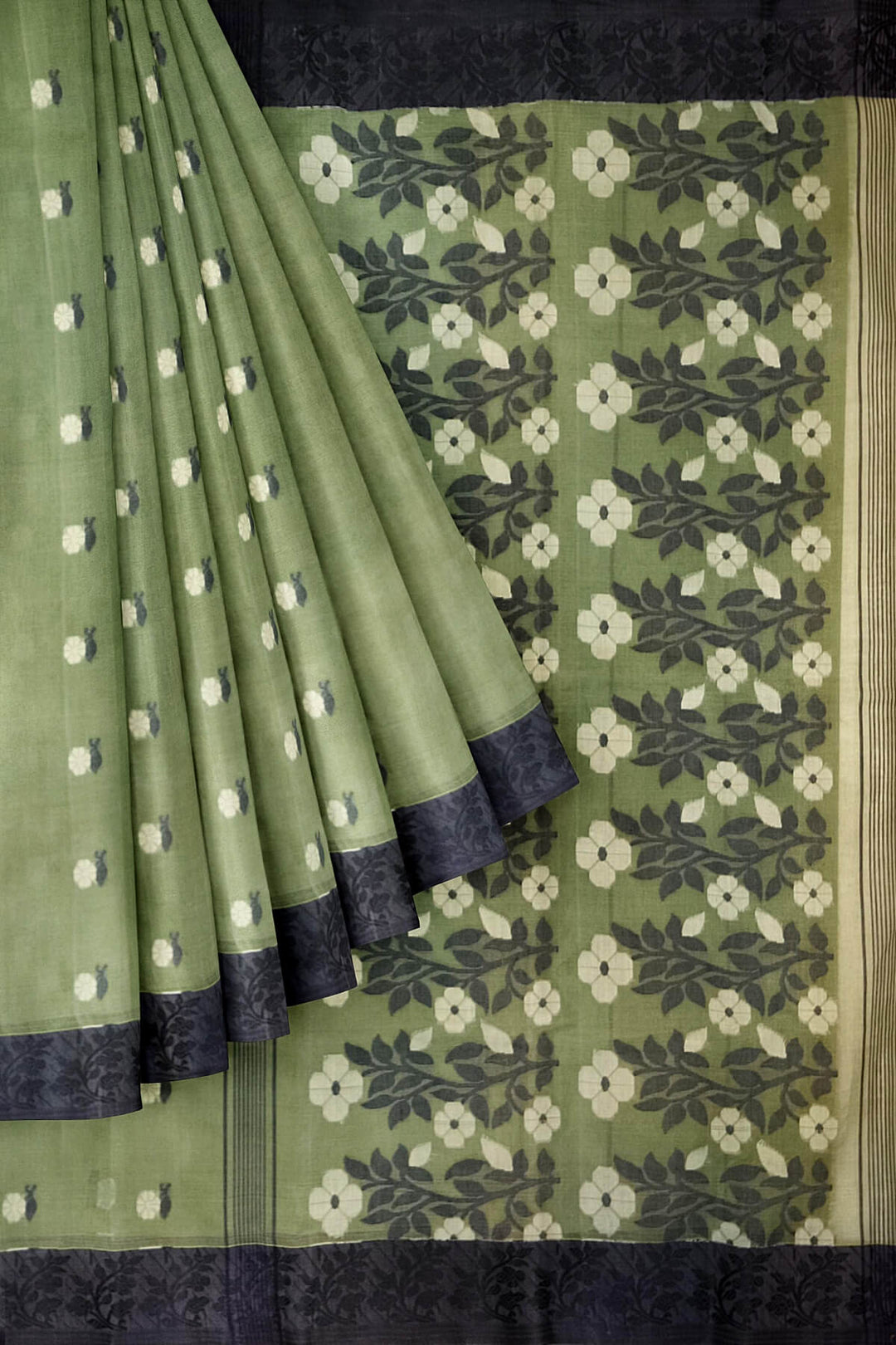 Cotton saree in green with floral motifs in Jamdani weave