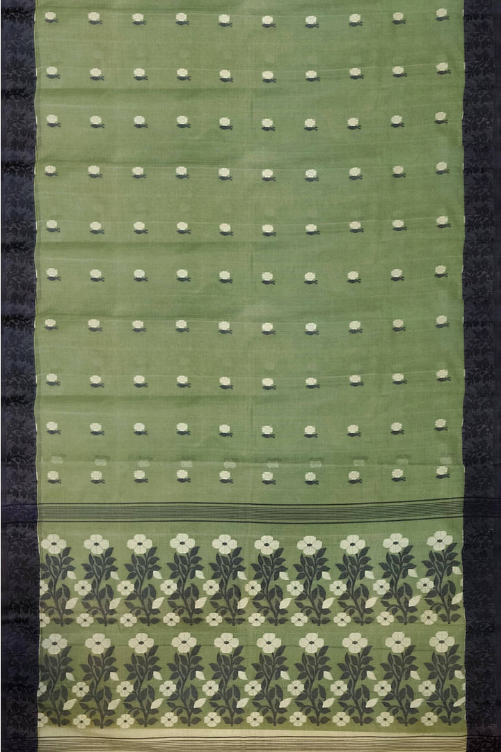 Cotton saree in green with floral motifs in Jamdani weave