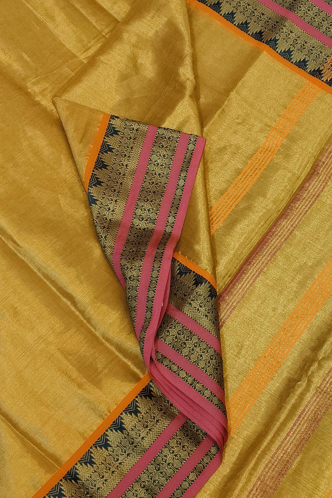 Soft tissue cotton saree in gold with temple border