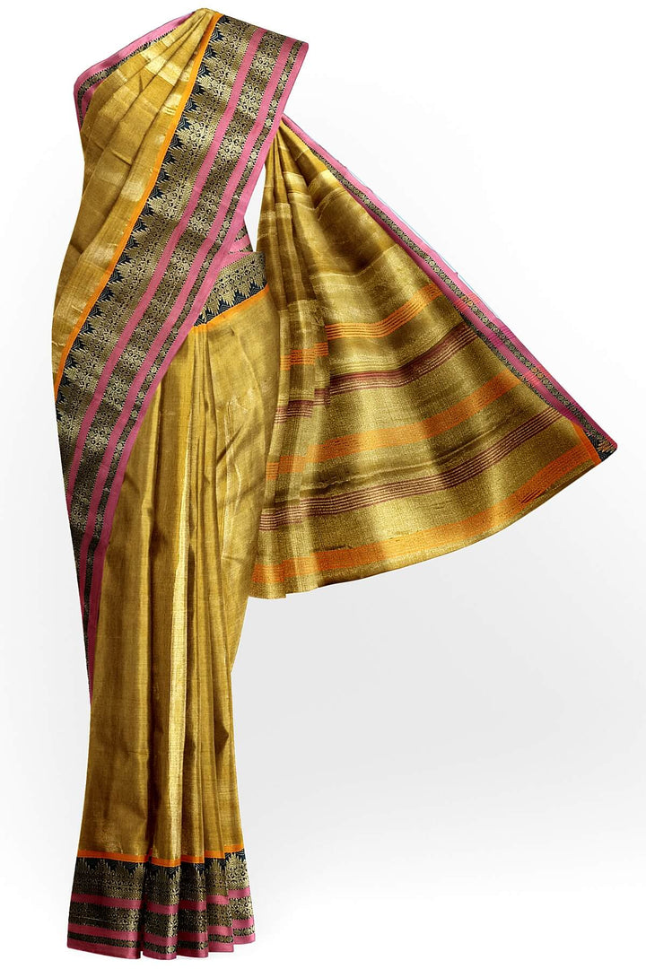 Soft tissue cotton saree in gold with temple border