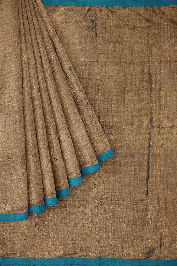 Small border soft tissue cotton saree in olive green