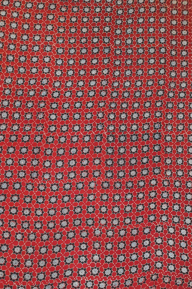 Dola silk saree in hand block ajrakh print  in  red with diamond motifs