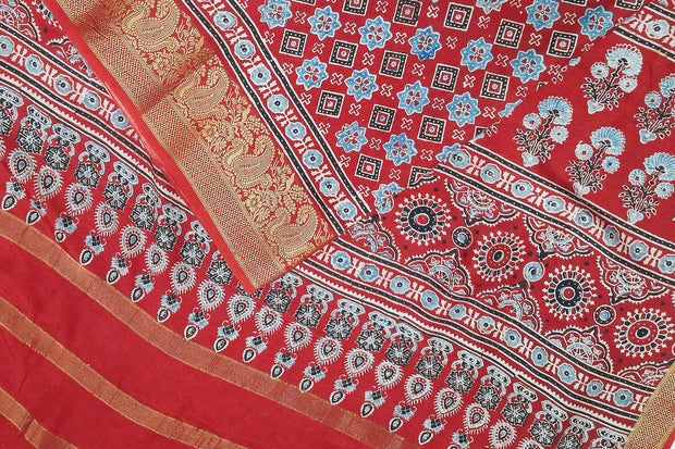 Dola silk saree in hand block ajrakh print  in  red with diamond motifs