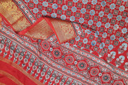 Dola silk saree in hand block ajrakh print  in  red with diamond motifs