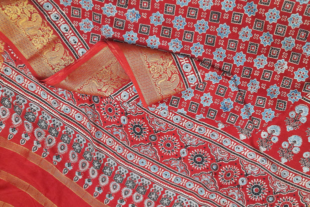 Dola silk saree in hand block ajrakh print  in  red with diamond motifs