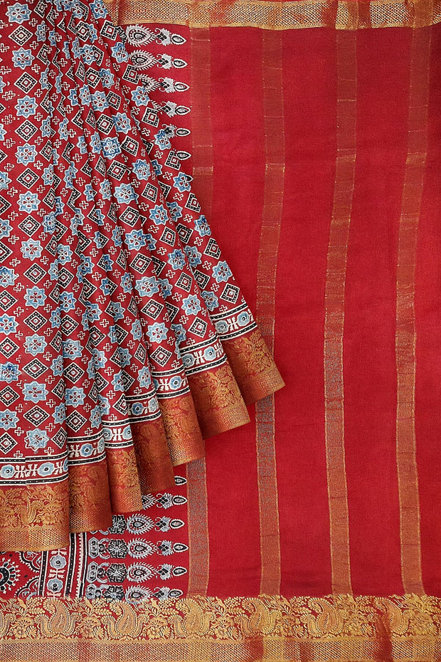 Dola silk saree in hand block ajrakh print  in  red with diamond motifs