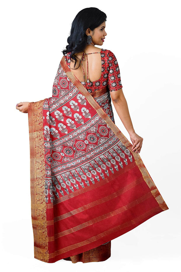 Dola silk saree in hand block ajrakh print  in  red with diamond motifs