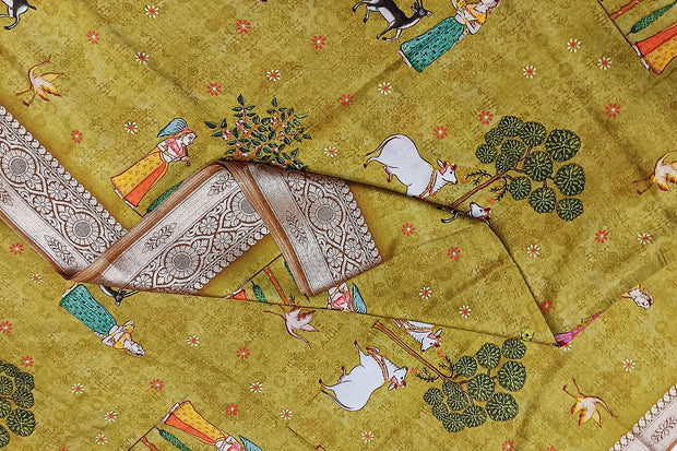 Dola silk saree in pichwai design in green gram colour