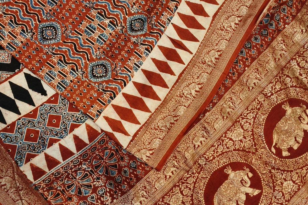 Dola silk saree in red with hand block Ajrakh print