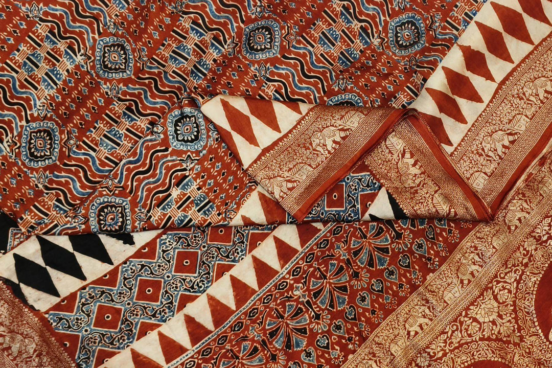Dola silk saree in red with hand block Ajrakh print
