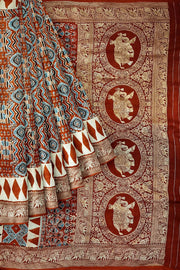 Dola silk saree in red with hand block Ajrakh print