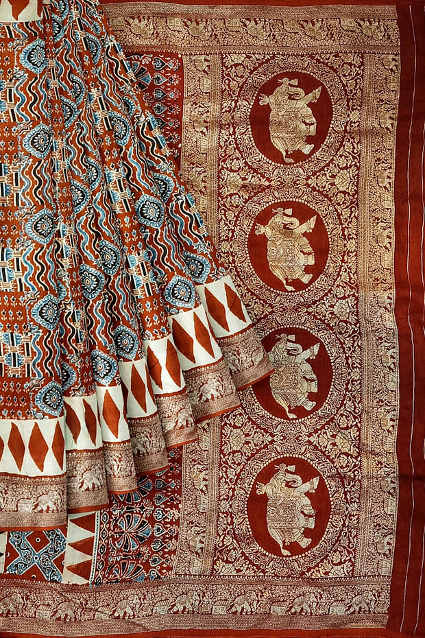 Dola silk saree in red with hand block Ajrakh print