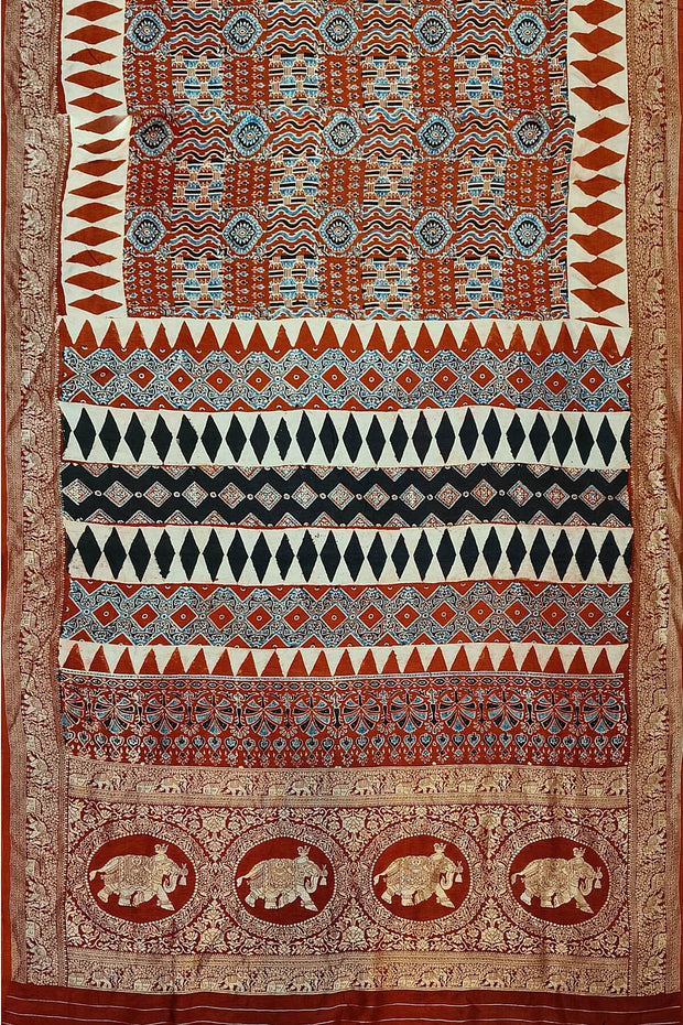 Dola silk saree in red with hand block Ajrakh print