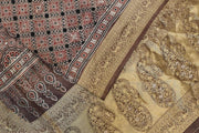 Dola silk saree in chickoo colour  with hand block Ajrakh print  with  paisley motifs in rich tissue pallu
