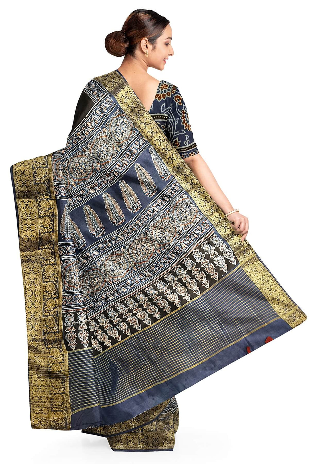 Dola silk saree in blue & black with floral motifs in  hand block Ajrakh print .