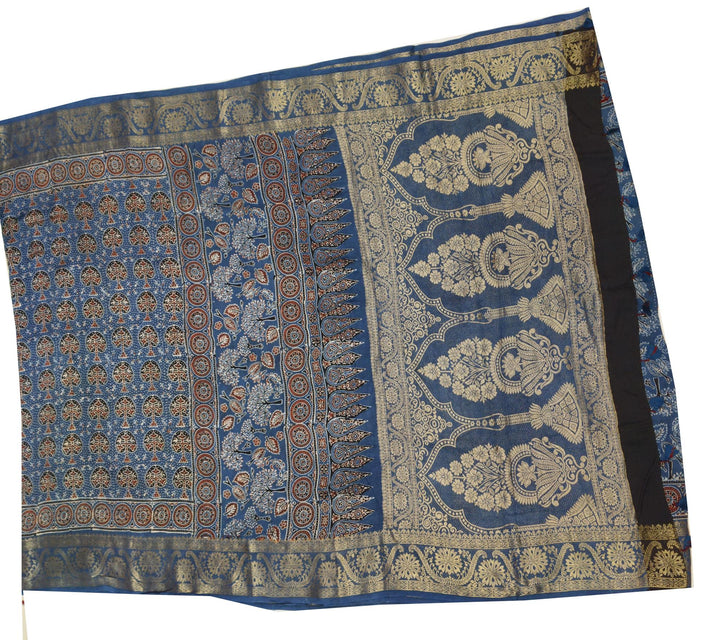 Dola silk saree in blue with floral motifs in hand block Ajrakh print