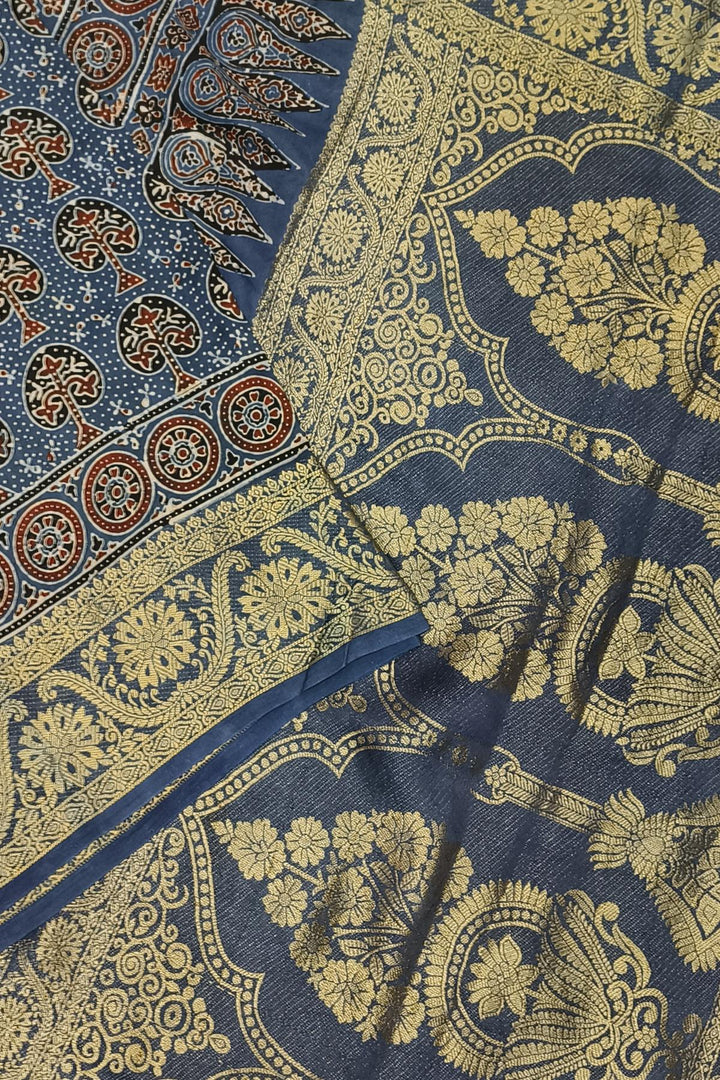 Dola silk saree in blue with floral motifs in hand block Ajrakh print