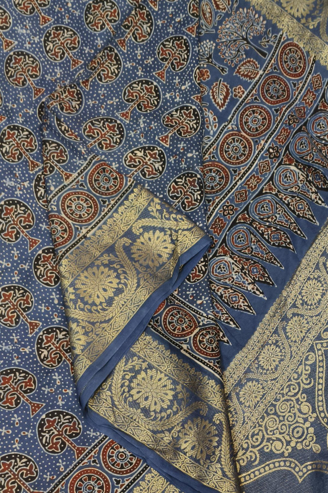 Dola silk saree in blue with floral motifs in hand block Ajrakh print