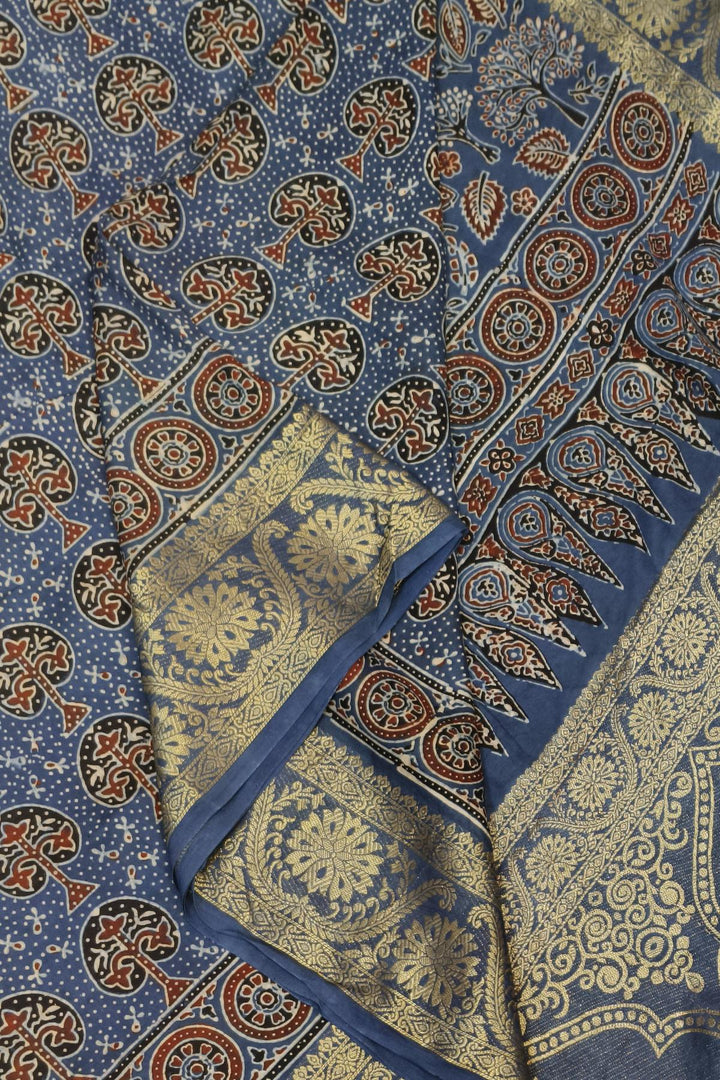 Dola silk saree in blue with floral motifs in hand block Ajrakh print