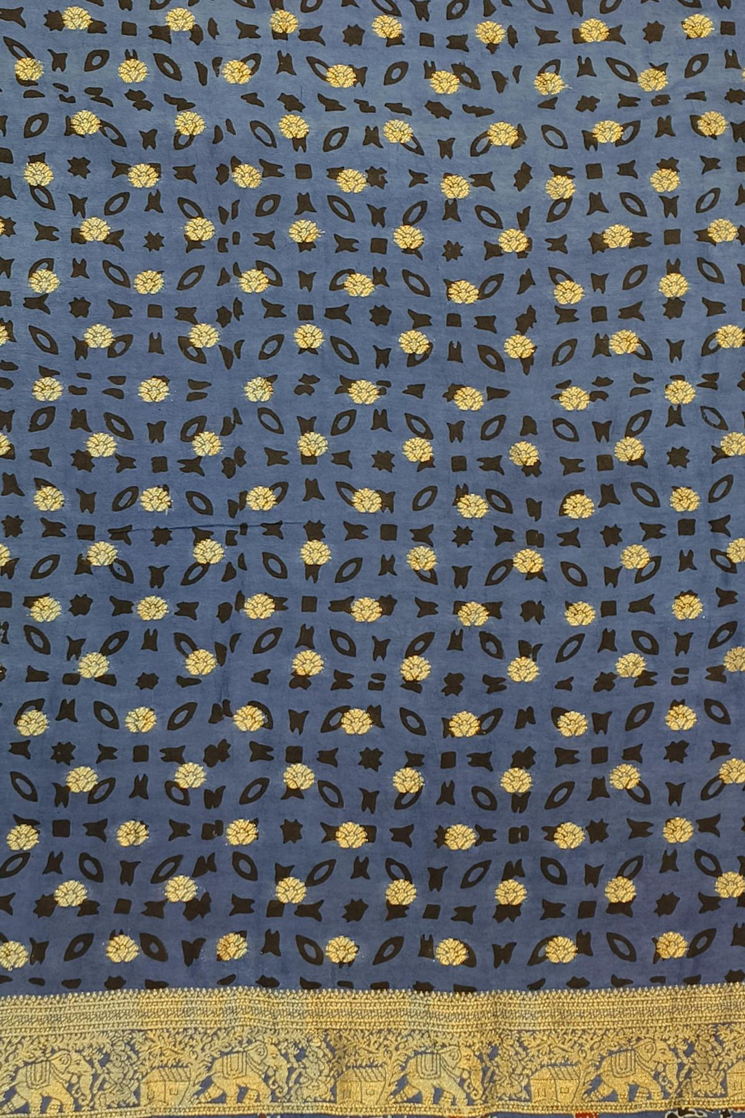 Dola silk saree in blue & red with floral motifs and a skirt border in hand block Ajrakh print