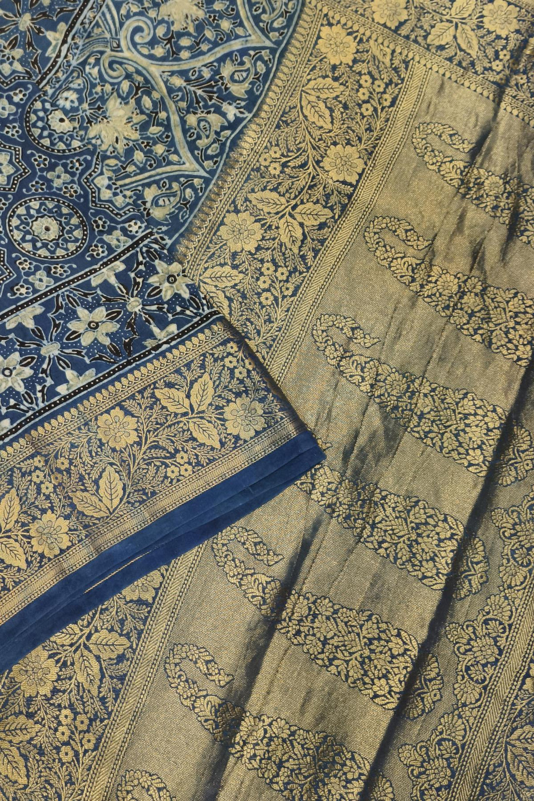 Dola silk saree in indigo  with floral motifs in circles  in hand block Ajrakh print