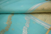 Banarasi kora (organza) silk saree in sea blue in half & half style.