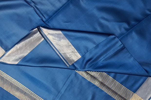 Handwoven Eri pure silk saree in blue with  striped pallu.