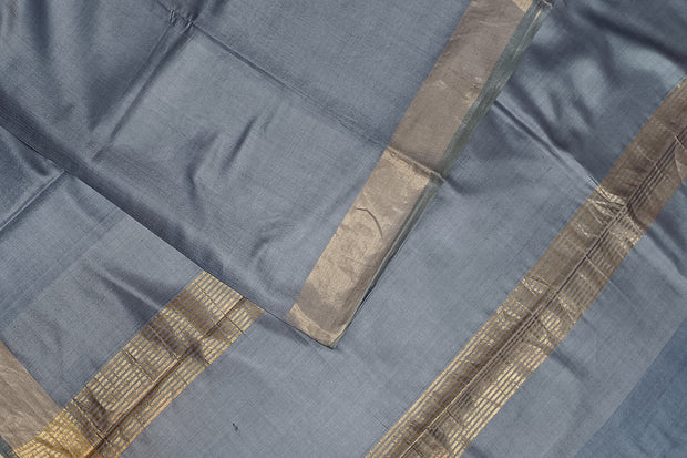 Handwoven Eri pure silk saree in grey with  striped pallu.