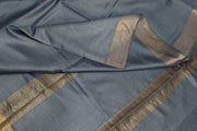 Handwoven Eri pure silk saree in grey with  striped pallu.