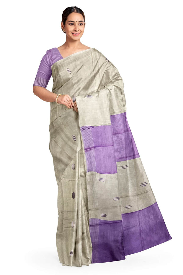 Handwoven Eri  silk saree in beige with striped pallu  and a contrast blouse