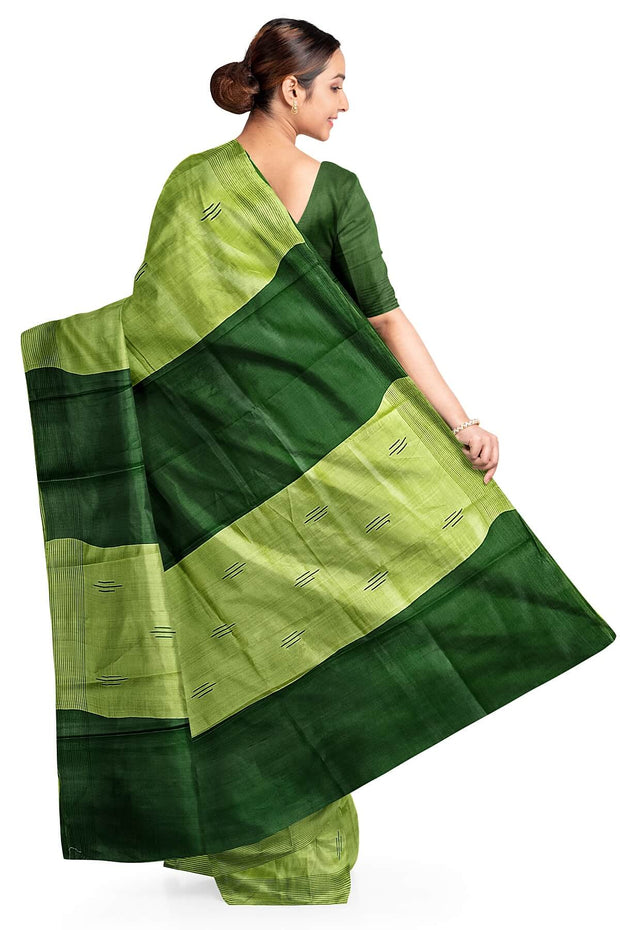 Handwoven Eri  silk saree in green with striped pallu  and a contrast blouse