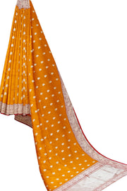 Handloom Banarasi katan pure silk saree in mustard colour with floral motifs
