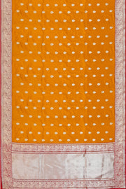 Handloom Banarasi katan pure silk saree in mustard colour with floral motifs