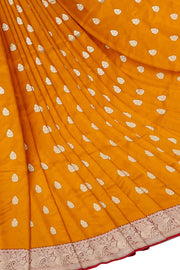 Handloom Banarasi katan pure silk saree in mustard colour with floral motifs