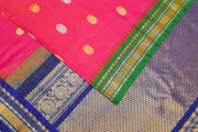 Gadwal pure silk saree in pink with gold & silver  motifs on the body and a rich contrast pallu .