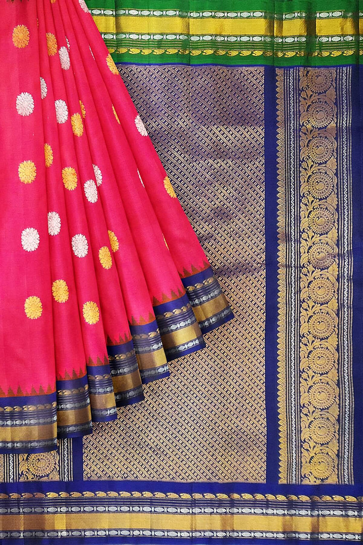 Gadwal pure silk saree in pink with gold & silver  motifs on the body and a rich contrast pallu .