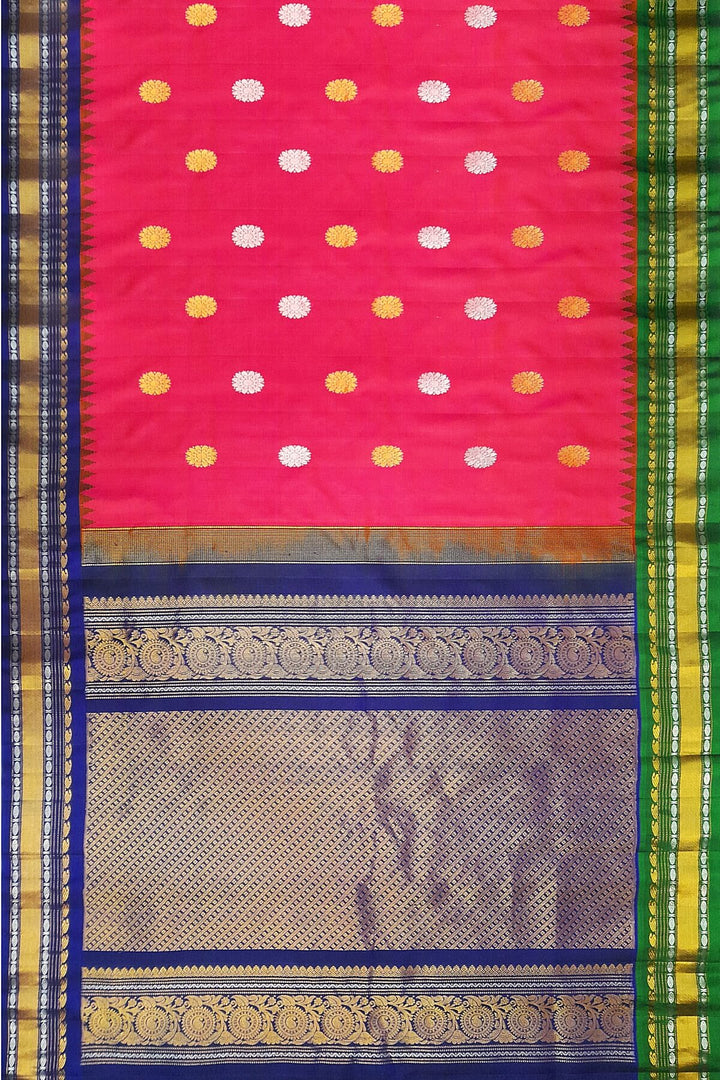 Gadwal pure silk saree in pink with gold & silver  motifs on the body and a rich contrast pallu .