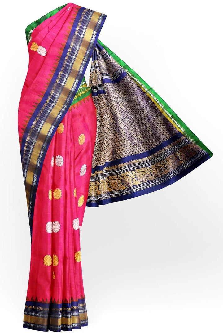 Gadwal pure silk saree in pink with gold & silver  motifs on the body and a rich contrast pallu .