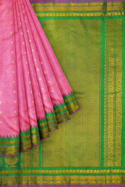 Handwoven Gadwal pure silk saree in pink  with gold & silver  motifs on the body