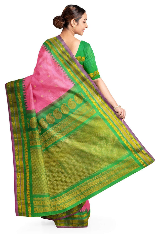 Handwoven Gadwal pure silk saree in pink  with gold & silver  motifs on the body