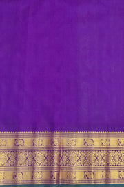 Gadwal pure silk saree is pista green with gold & silver  motifs on the body