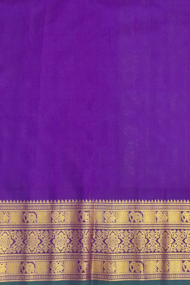 Gadwal pure silk saree is pista green with gold & silver  motifs on the body