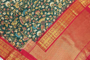 Gadwal pure silk  printed  kalamkari  dark green saree with floral & birds motifs .