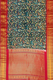 Gadwal pure silk  printed  kalamkari  dark green saree with floral & birds motifs .