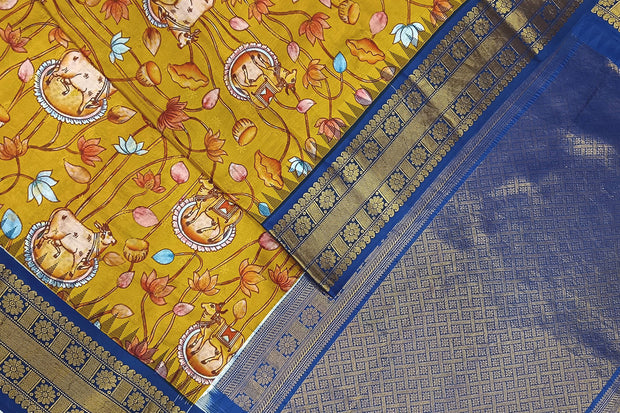 Gadwal pure silk printed pichwai design mustard saree with lotus vines & cows.