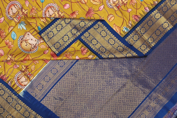 Gadwal pure silk printed pichwai design mustard saree with lotus vines & cows.