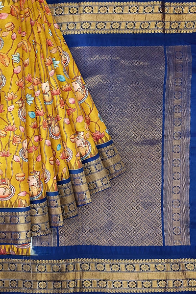 Gadwal pure silk printed pichwai design mustard saree with lotus vines & cows.