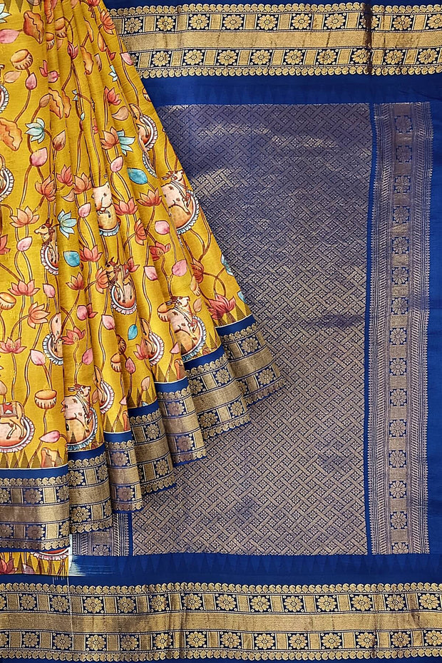 Gadwal pure silk printed pichwai design mustard saree with lotus vines & cows.