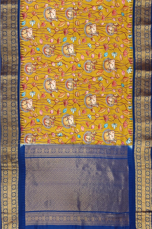 Gadwal pure silk printed pichwai design mustard saree with lotus vines & cows.