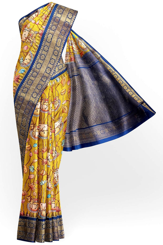Gadwal pure silk printed pichwai design mustard saree with lotus vines & cows.